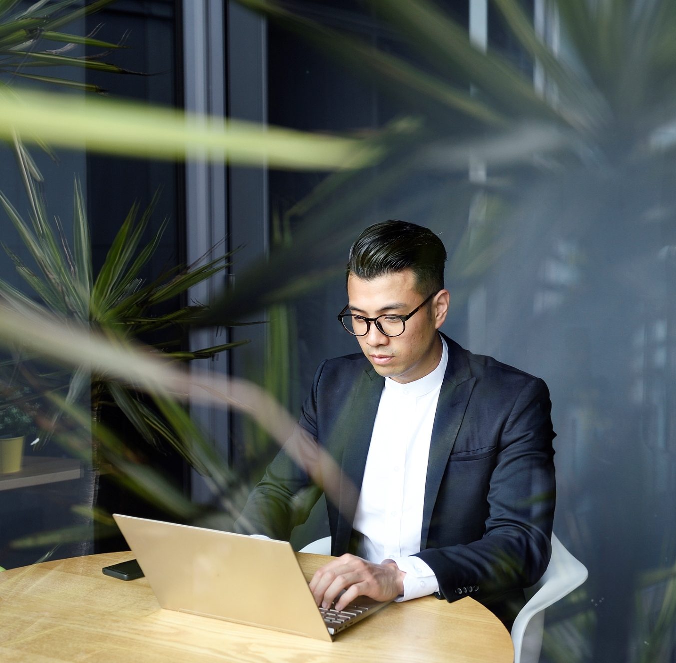 Young professional developing expertise in a modern and collaborative workplace